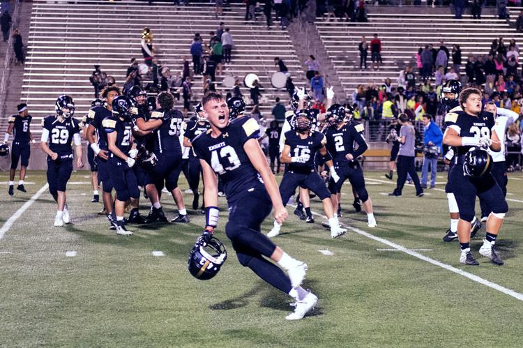 Lincoln Southeast punter Grant Detlefsen celebrates after the Knights 14-10 win over Lincoln Southwest at Seacrest Field on Friday Oct. 26.