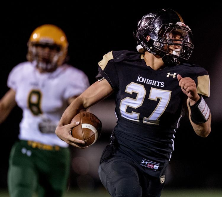 Lincoln Southeasts [senior running back] Jaden Davis (27) scores the game-winning touchdown late in the fourth quarter against Pius X on Thursday, Oct. [4], 2018, at Seacrest Field.