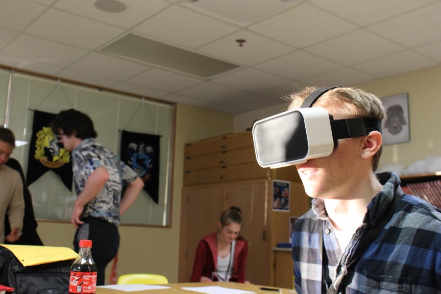 Senior Thomas Reinke tests a VR rollercoaster
Photo Cred: Seth Householder
