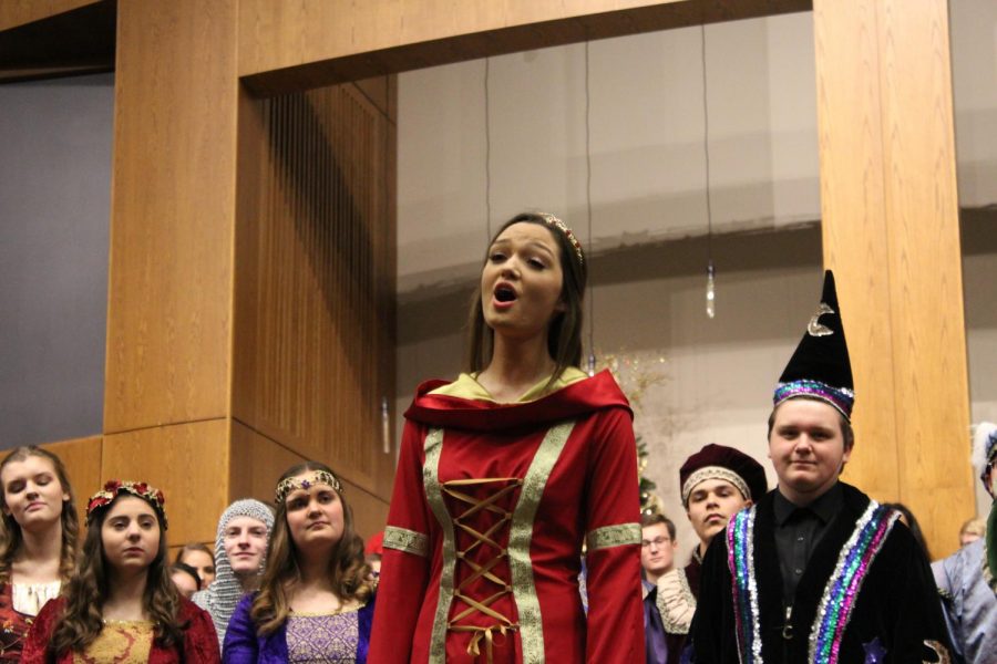 Morgan Murphy, Queen of the Bel Canto Choir, stands in front of her peers and preforms one of their winter songs. For several years Bel Canto has hosted the Winter Concert. Not only have they performed, but they have also featured the other eight choirs.
