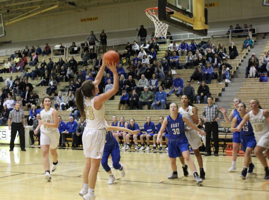 Meg Hatfield attempts a two point shot against East during the game on Friday, Jan. 11.