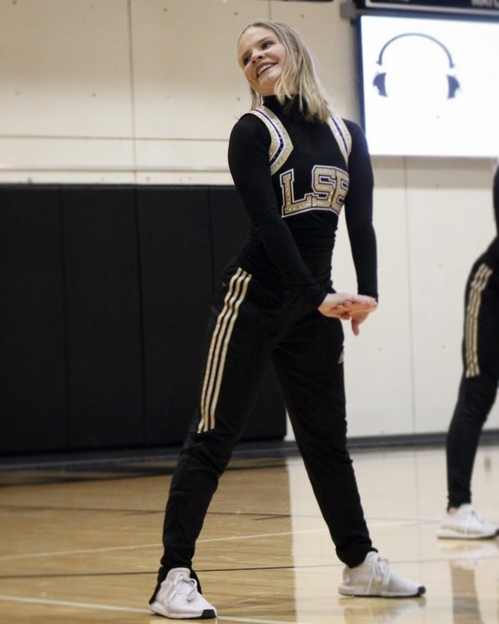 Senior Whitney Reinmiller dances during half time on the Feb. 1.