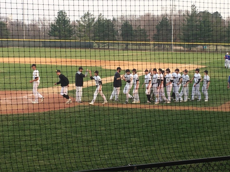 Knights Varsity Baseball gets their first win against Spartans