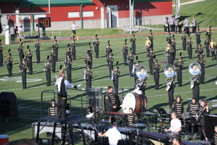 Junior Rachel Odabasi conducts the Marching Band during last seasons show.