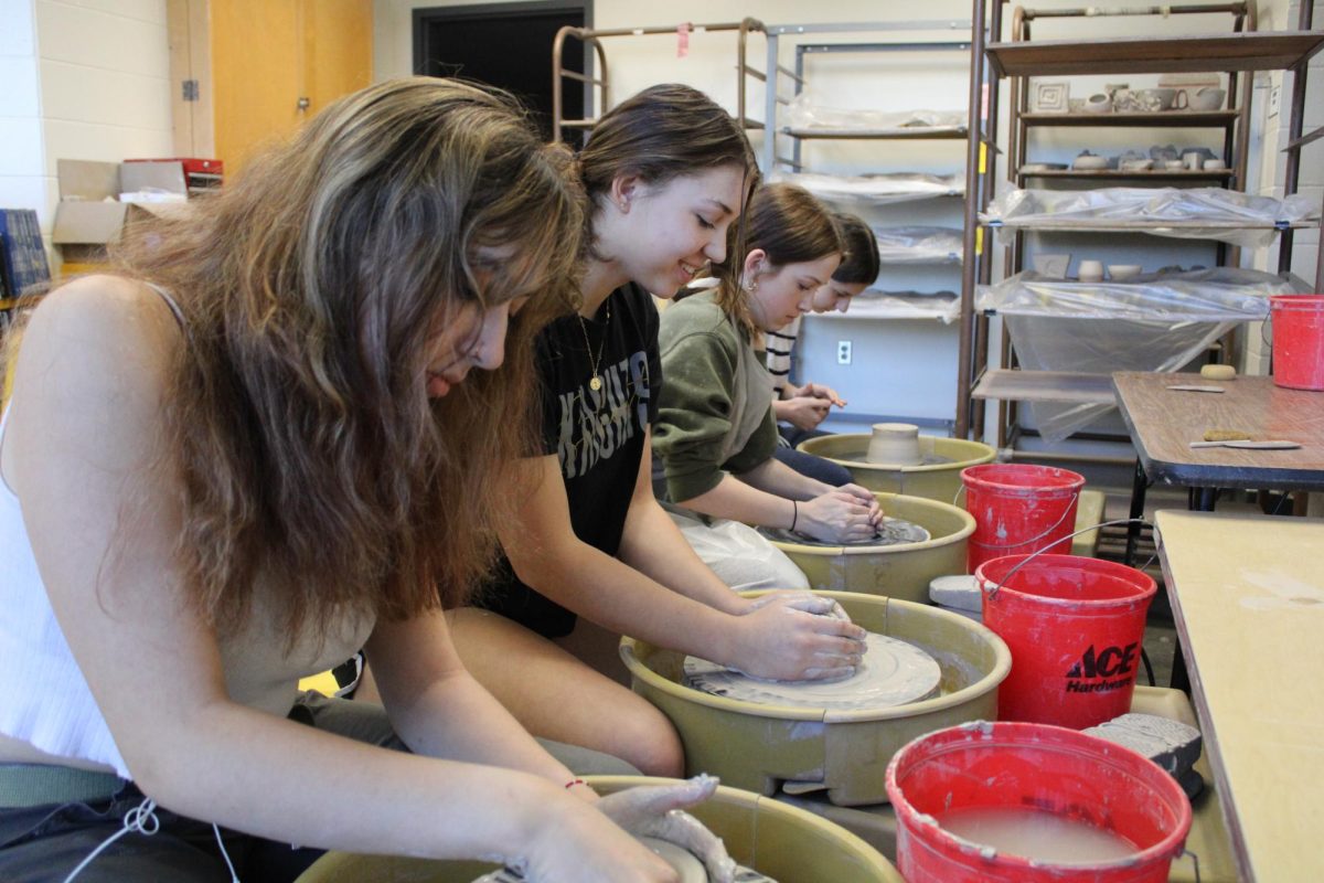 Empty Bowls members work on their bowls to be sold at LSEs art shows. 