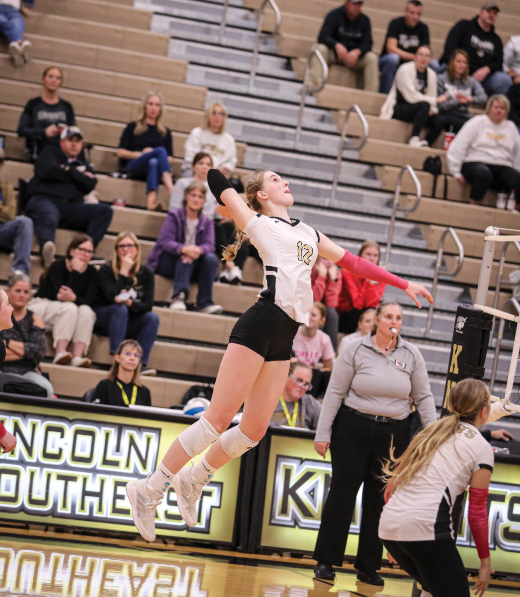 Natalie Wardlow jumps for her attack on the opposing team. 