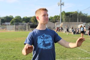 Neesen conducts out on the practice field.