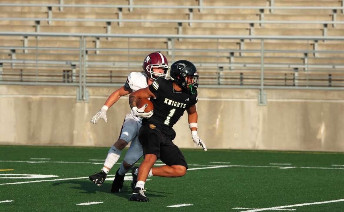 Dane Omel returns a kickoff for Lincoln Southeast.