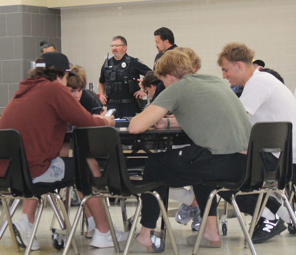 Officer Carmichael monitors the lunchroom, making sure shenanigans
are kept to a minimum.