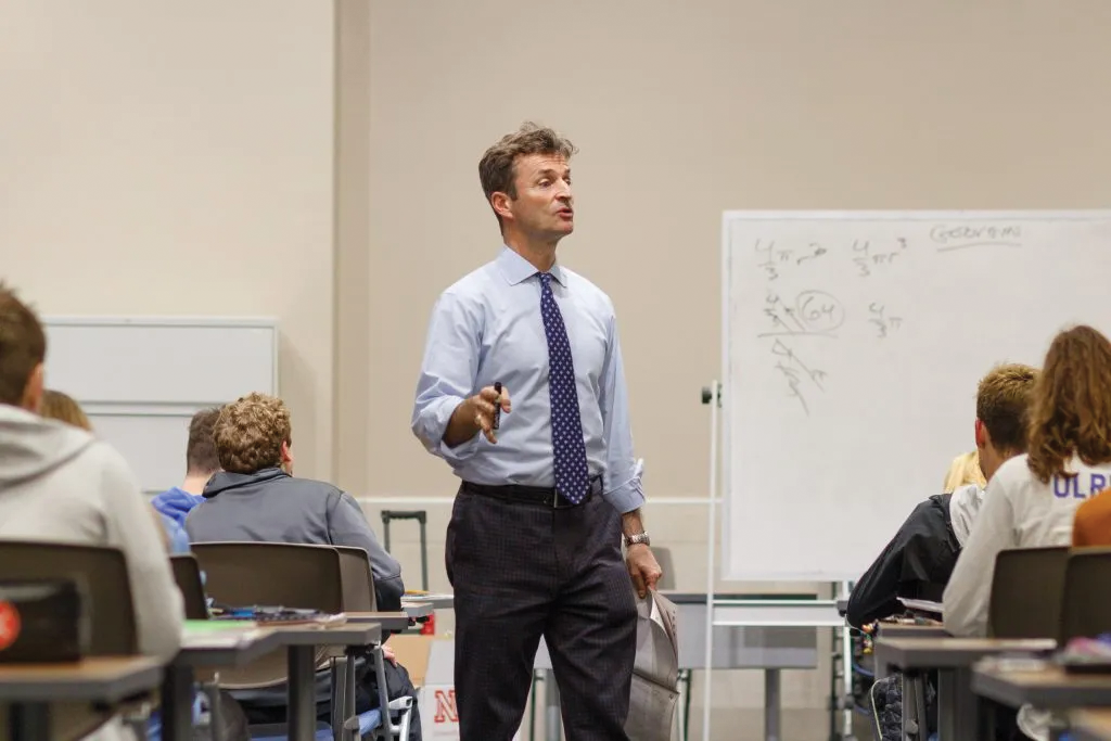 John Baylor teaches and inspires a classroom of students. 

Photo Credit: John Baylor
